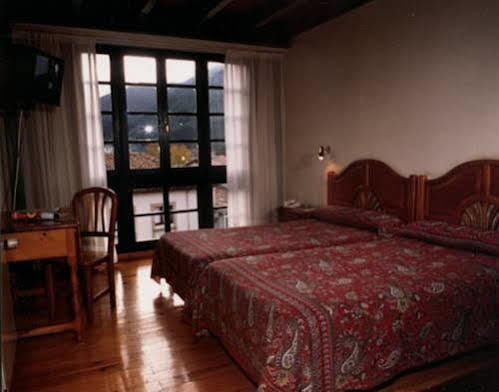 Apartamentos Cuevas Del Mar ヌエバ・デ・リャネス エクステリア 写真
