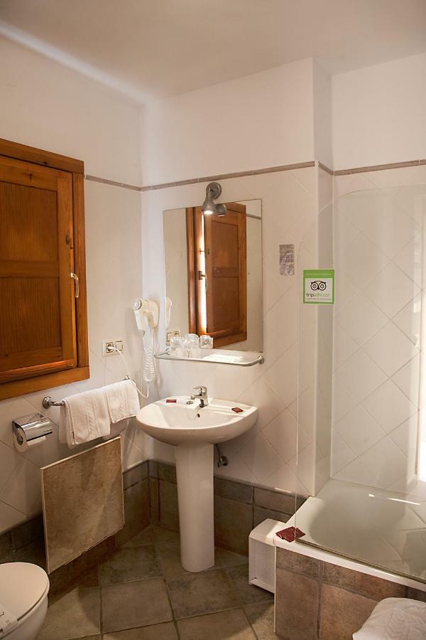 Apartamentos Cuevas Del Mar ヌエバ・デ・リャネス エクステリア 写真